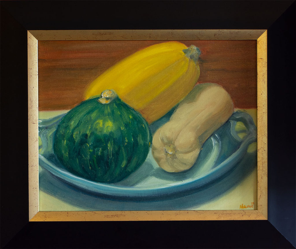 Three winter squashes on a platter